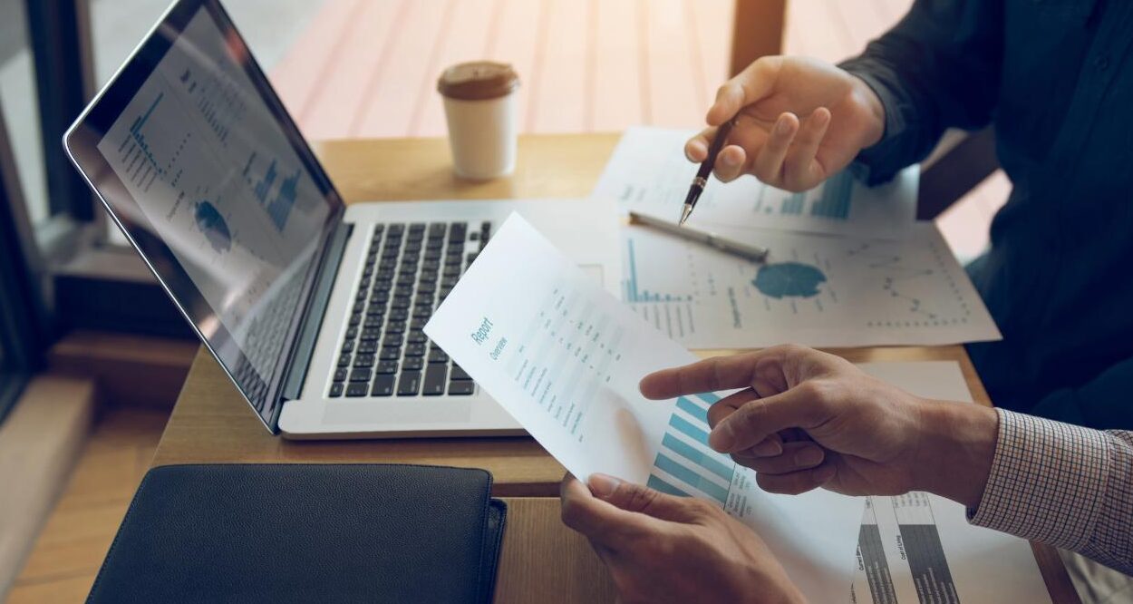 Business partners reviewing financial reports