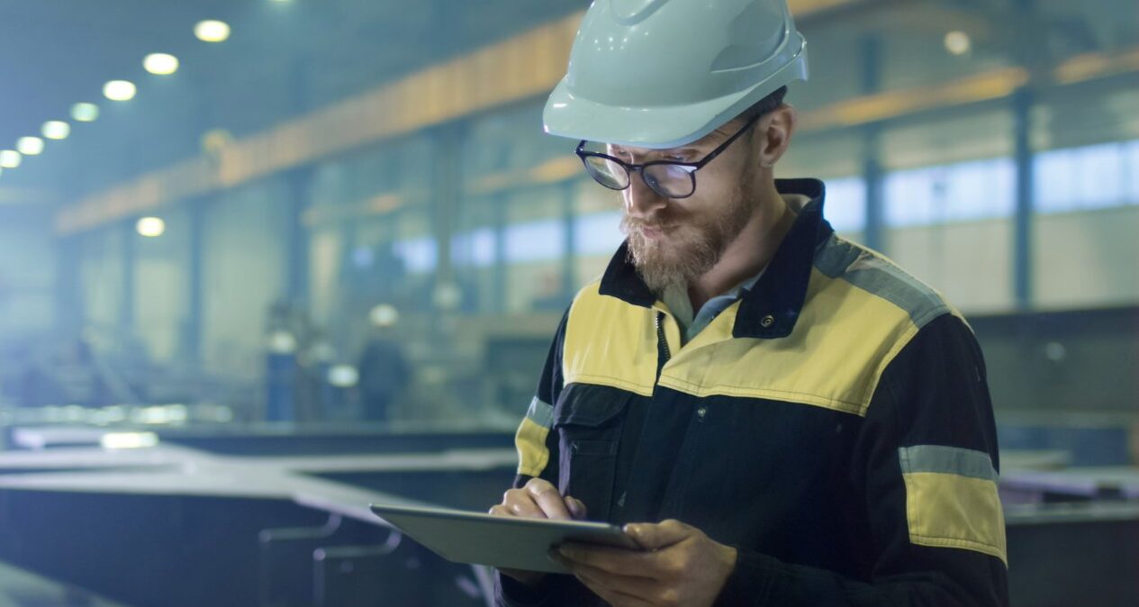 Manual worker on tablet